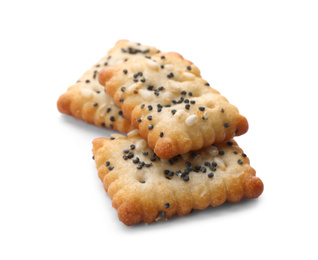 Photo of Delicious crispy crackers with poppy and sesame seeds isolated on white