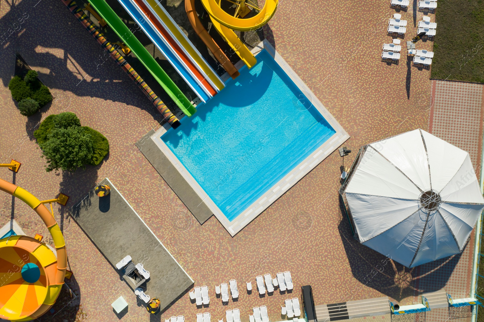 Image of Aerial view of water park on sunny day