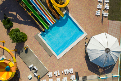 Image of Aerial view of water park on sunny day