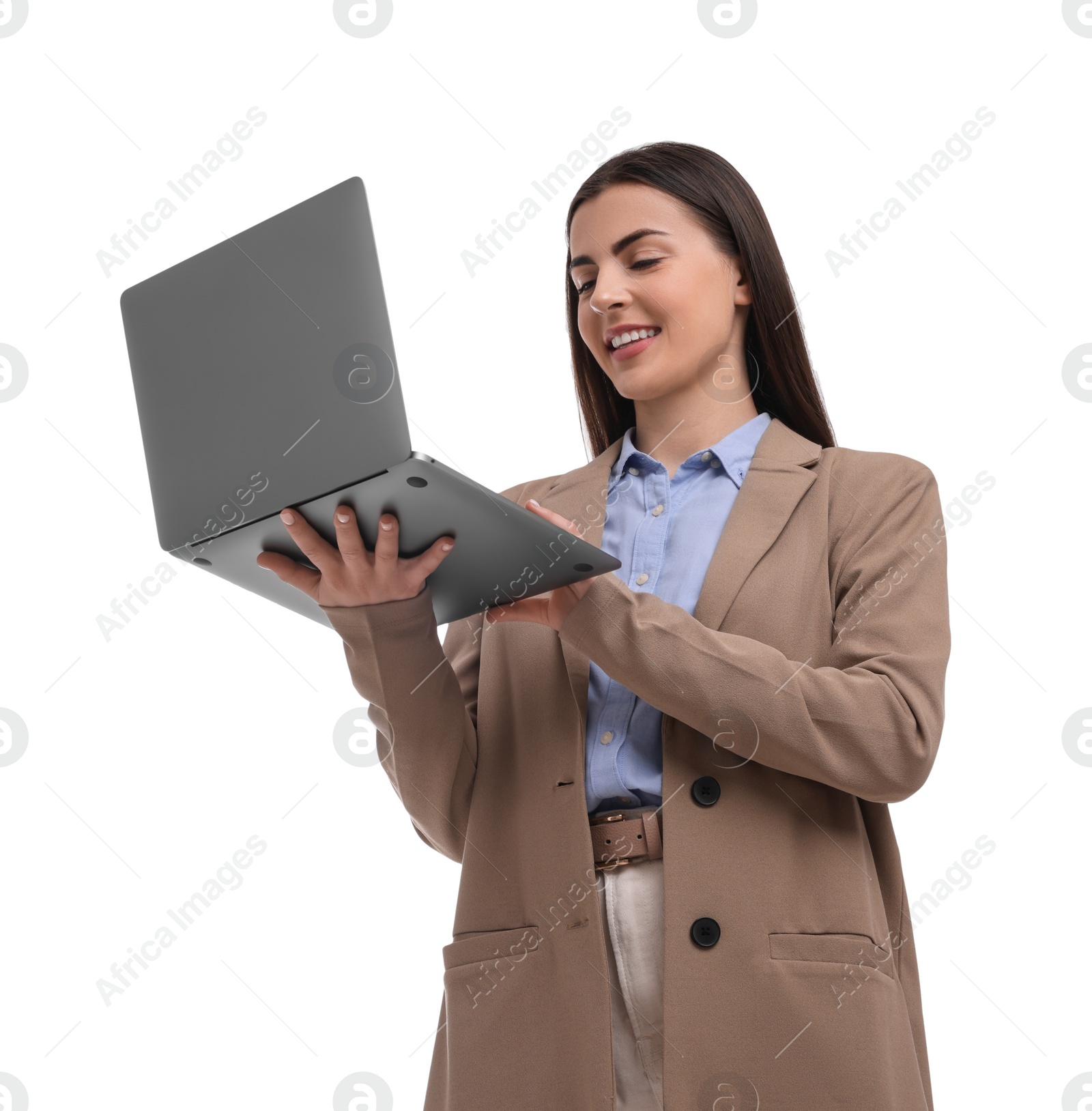 Photo of Beautiful happy businesswoman using laptop on white background, low angle view