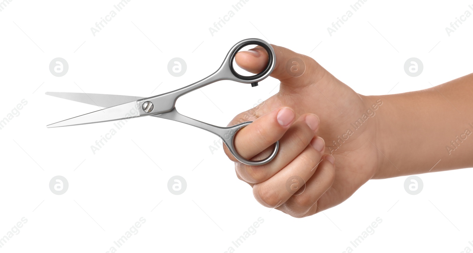 Photo of Hairdresser holding professional scissors isolated on white, closeup. Haircut tool