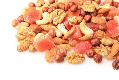 Different tasty nuts and dried papayas on beige background, space for text