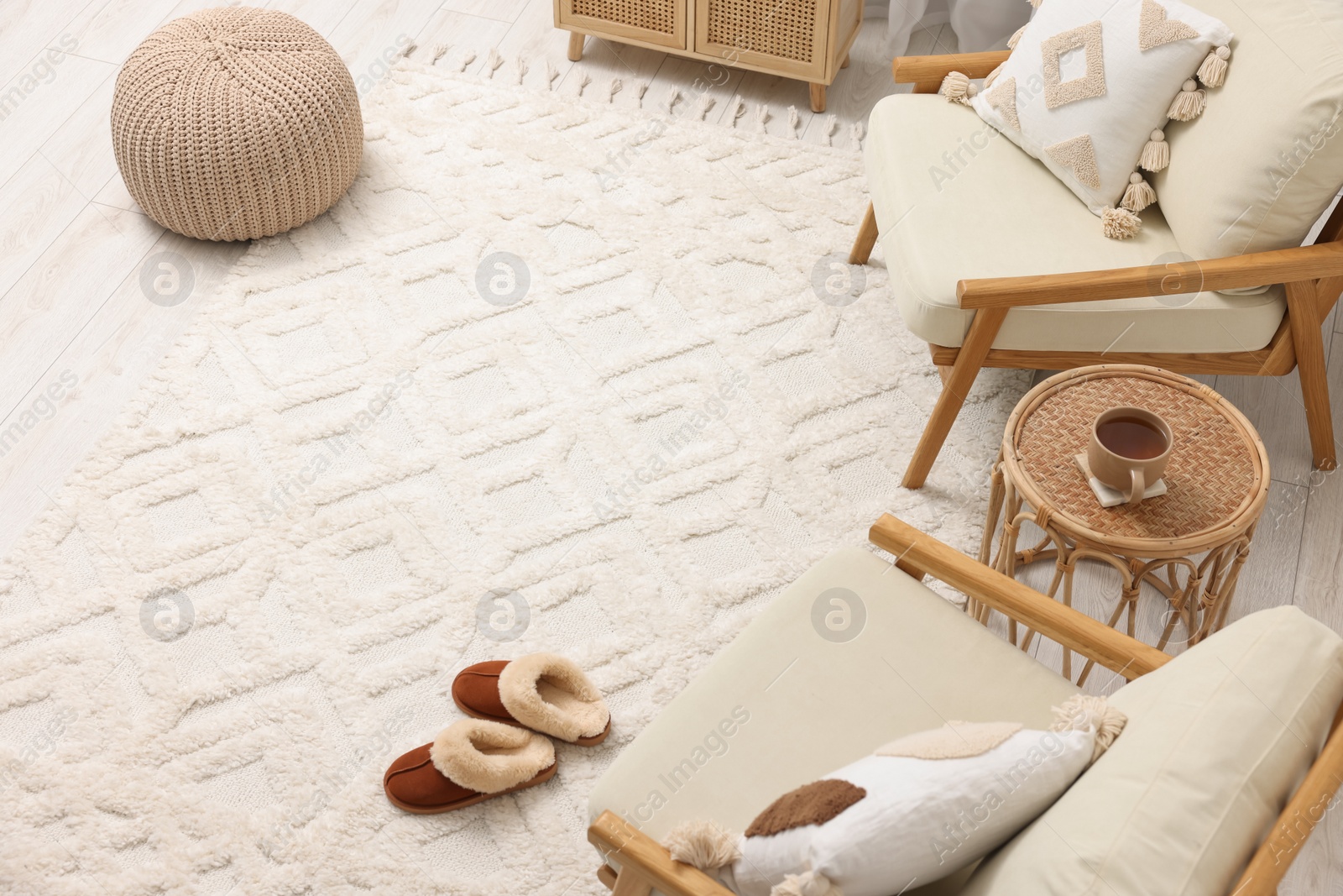 Photo of Stylish living room with soft white carpet and furniture, above view. Interior design