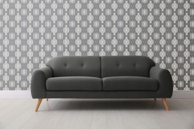 Image of Minimalist living room interior with comfortable grey sofa