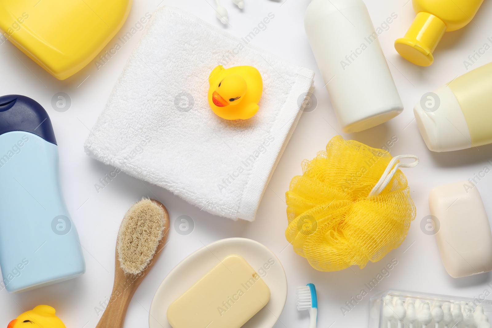 Photo of Baby bath accessories and care products on white background, flat lay