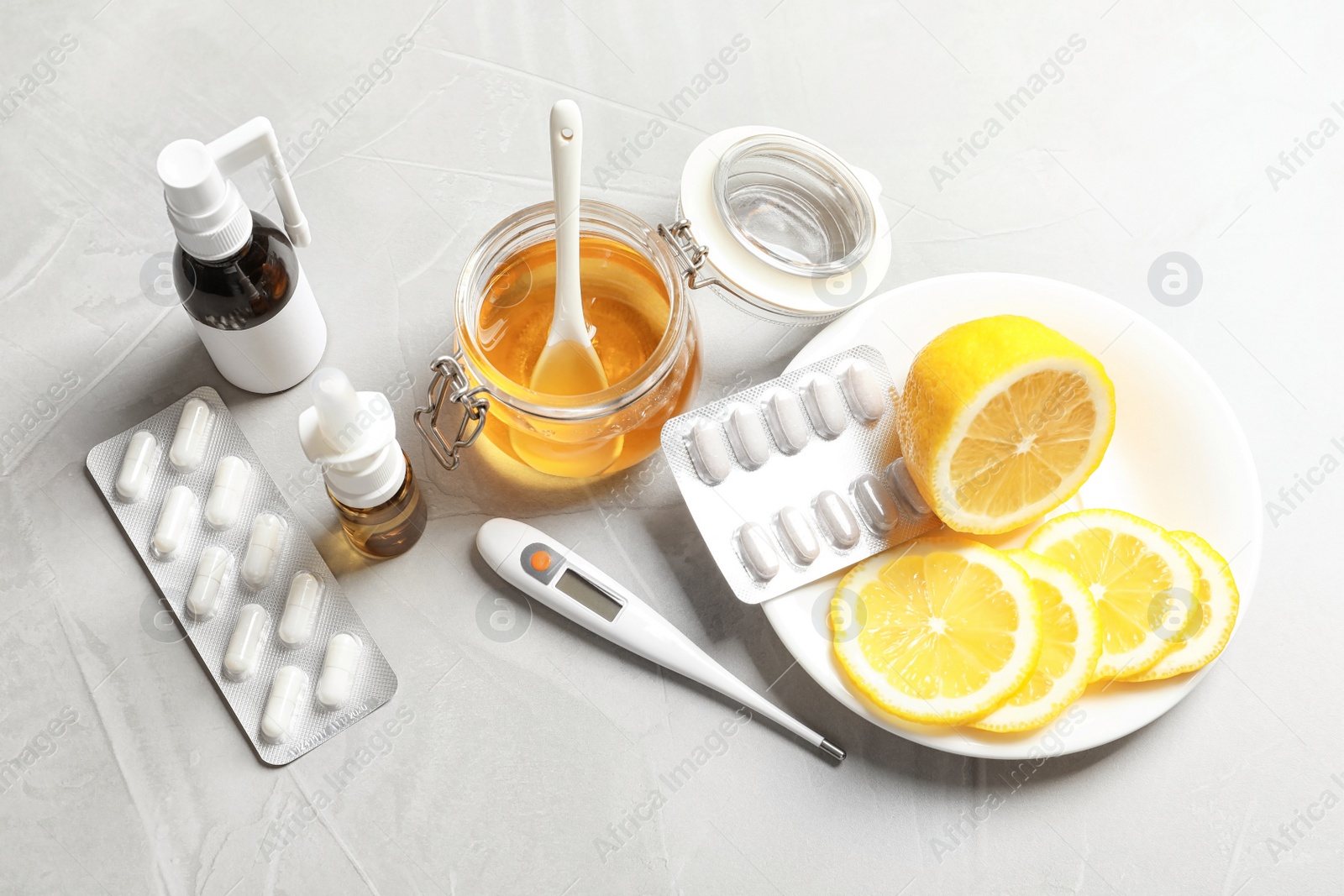 Photo of Natural and medical cold remedies on table