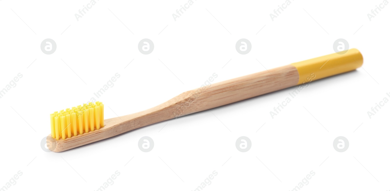 Photo of Toothbrush made of bamboo on white background