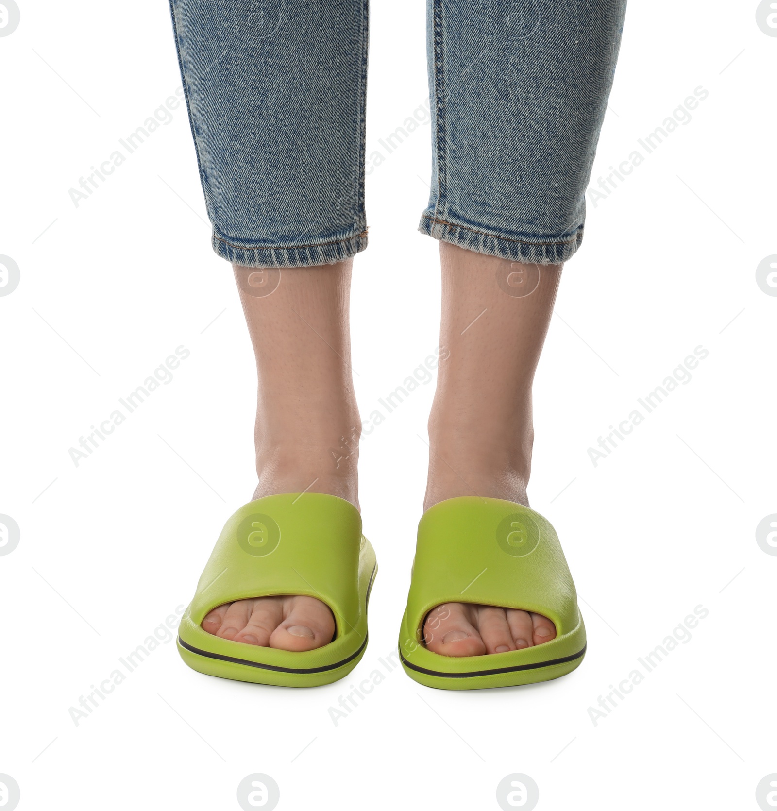 Photo of Woman in green slippers on white background, closeup