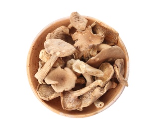 Photo of Bowl of dried mushrooms isolated on white, top view