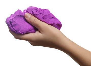 Woman playing with kinetic sand on white background, closeup