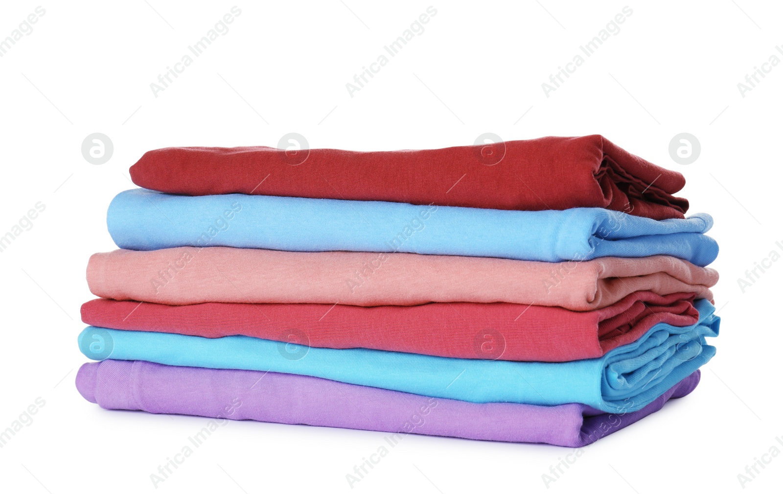 Photo of Stack of folded clothes on white background