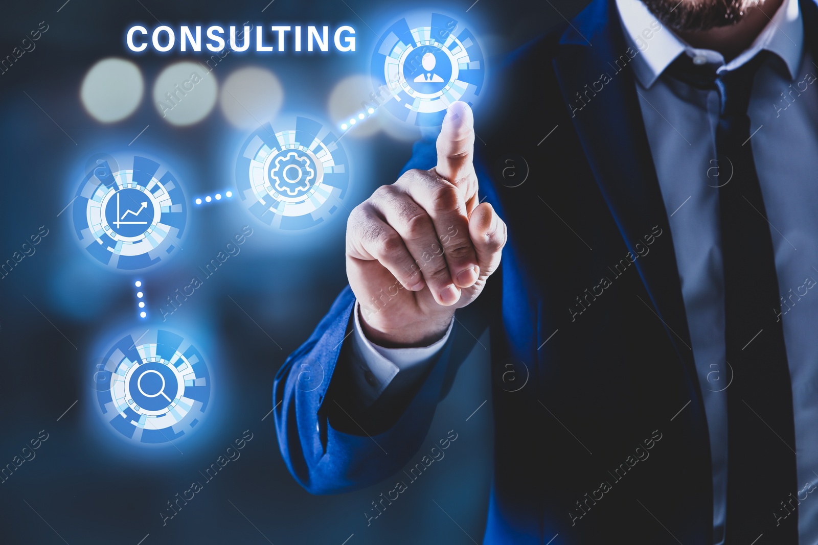 Image of Consulting concept. Businessman pointing on dark background, closeup