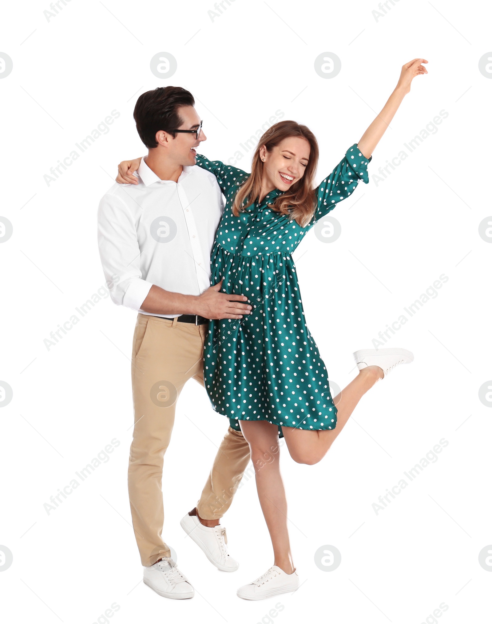 Photo of Beautiful young couple dancing on white background