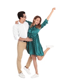 Photo of Beautiful young couple dancing on white background