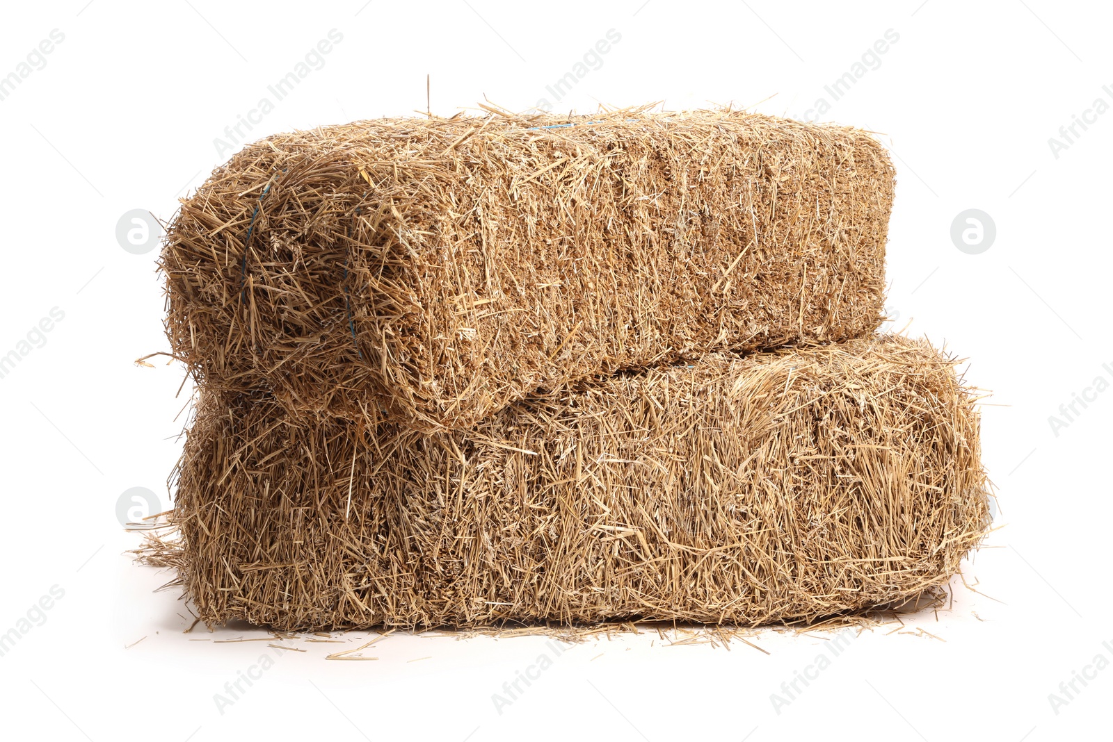 Photo of Bales of dried straw isolated on white