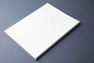 Photo of Blank book on dark grey background. Mock up for design