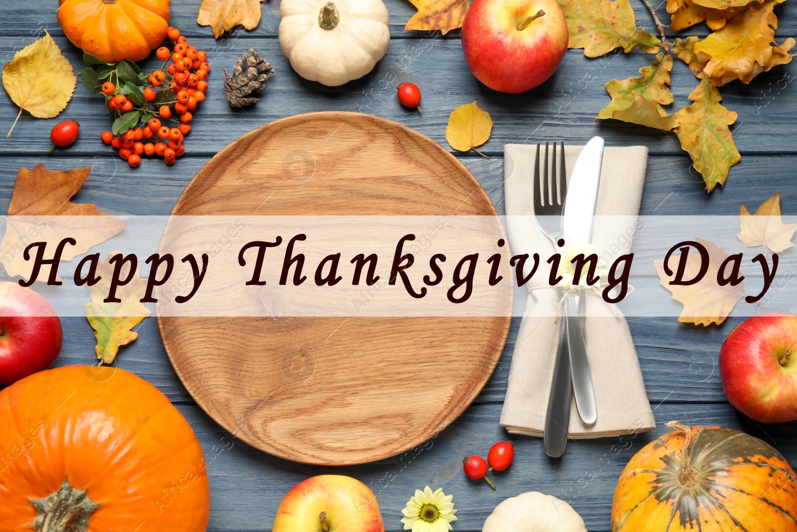 Image of Happy Thanksgiving Day card. Flat lay composition with tableware, autumn fruits and vegetables on blue wooden table