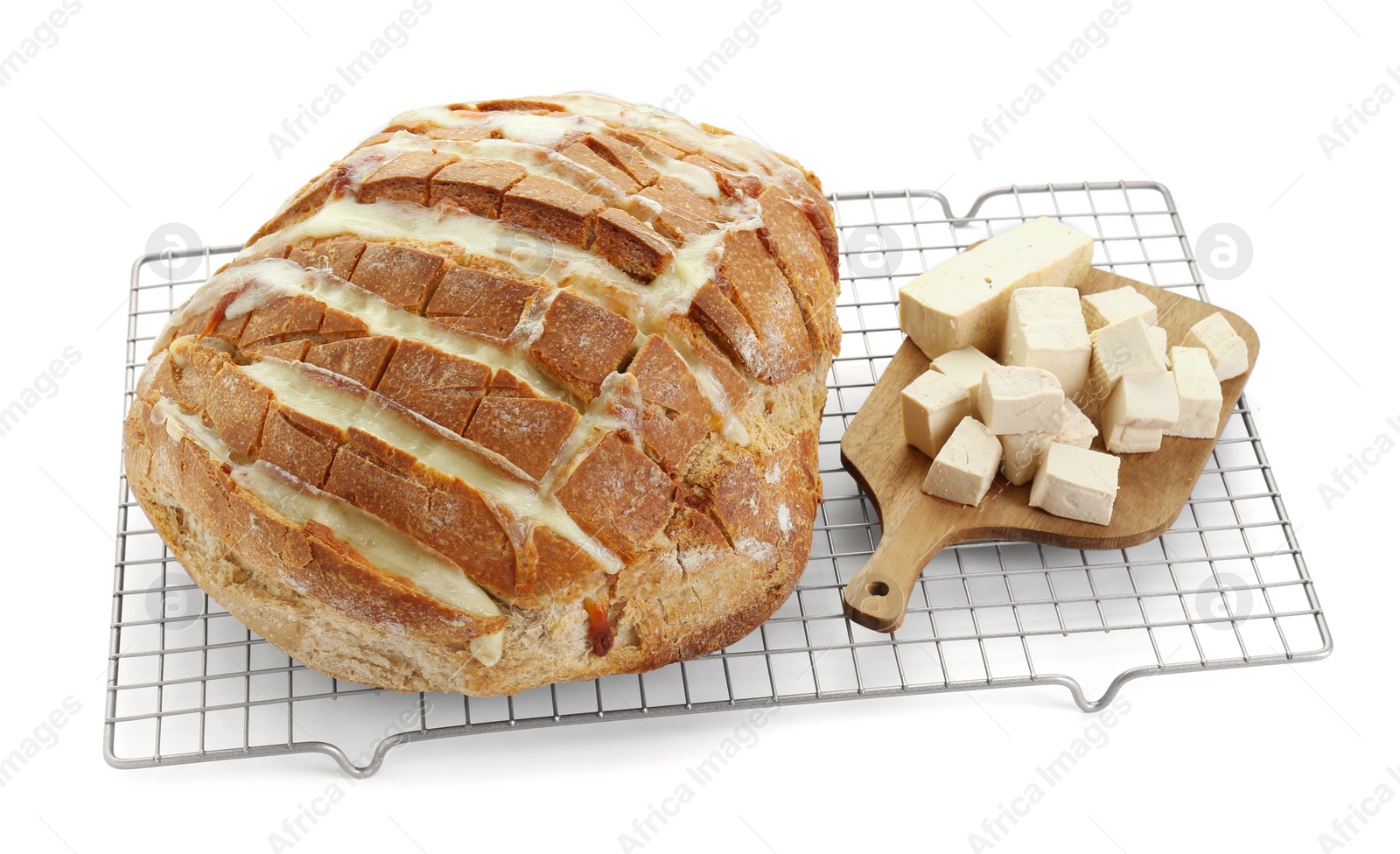 Photo of Freshly baked bread with tofu cheese isolated on white