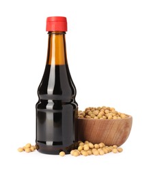 Bottle of soy sauce and soybeans isolated on white