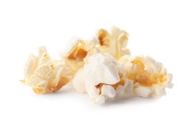 Photo of Delicious salty popcorn on white background