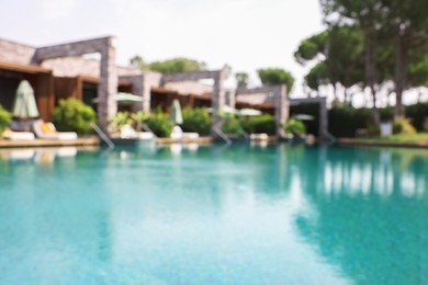 Photo of Outdoor swimming pool at resort, blurred view