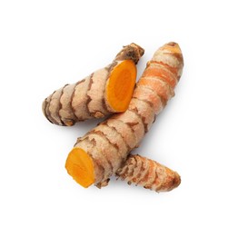 Photo of Fresh whole and cut turmeric roots isolated on white, top view