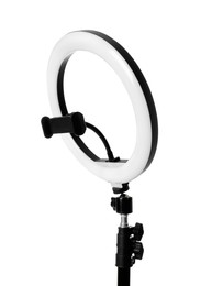 Photo of Modern ring light on stand against white background