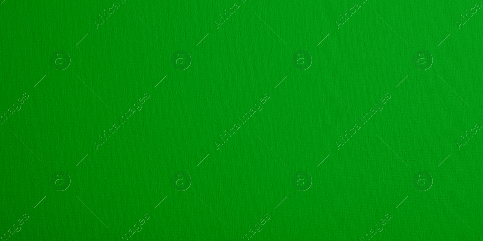 Image of Textured bright green background. Chroma key compositing