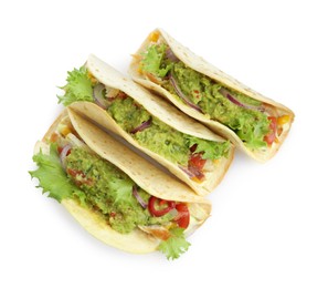 Photo of Delicious tacos with guacamole and vegetables isolated on white, top view