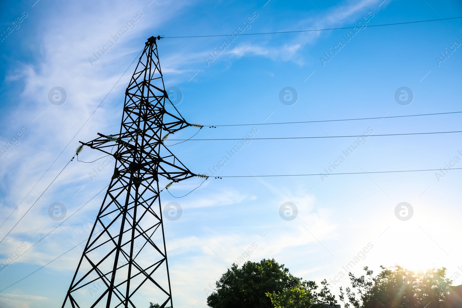 Photo of High voltage tower against beautiful blue sky