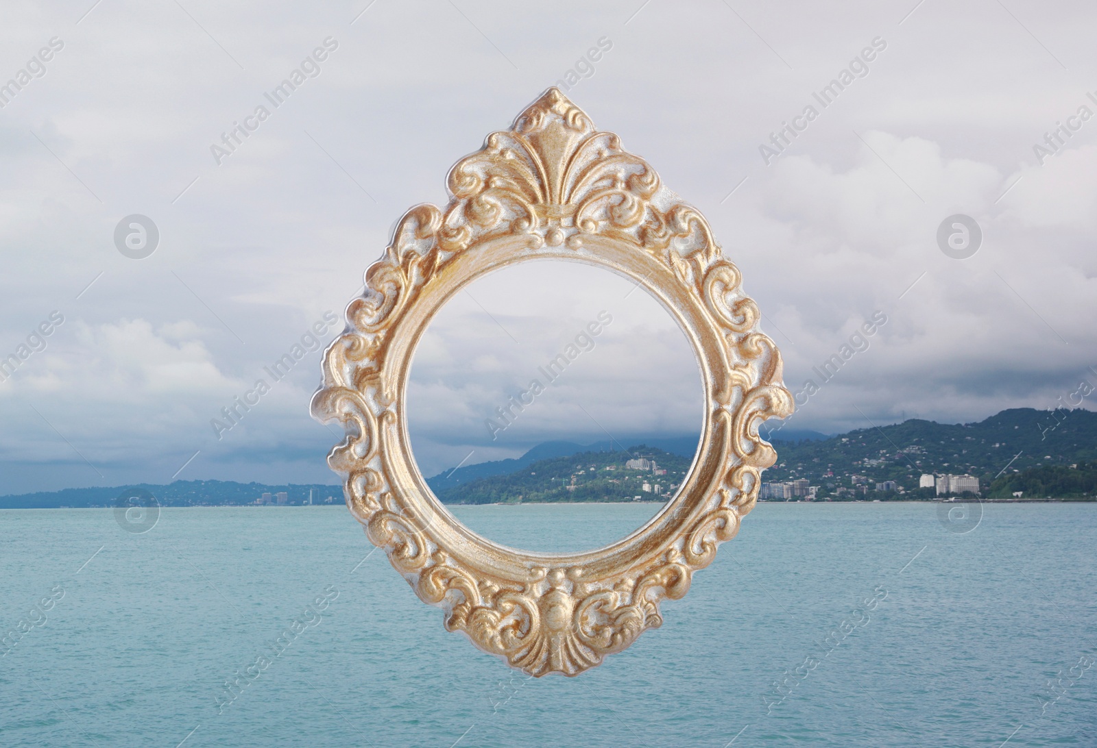 Image of Vintage frame and mountains near sea under cloudy sky