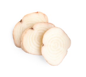 Pieces of sugar beet on white background