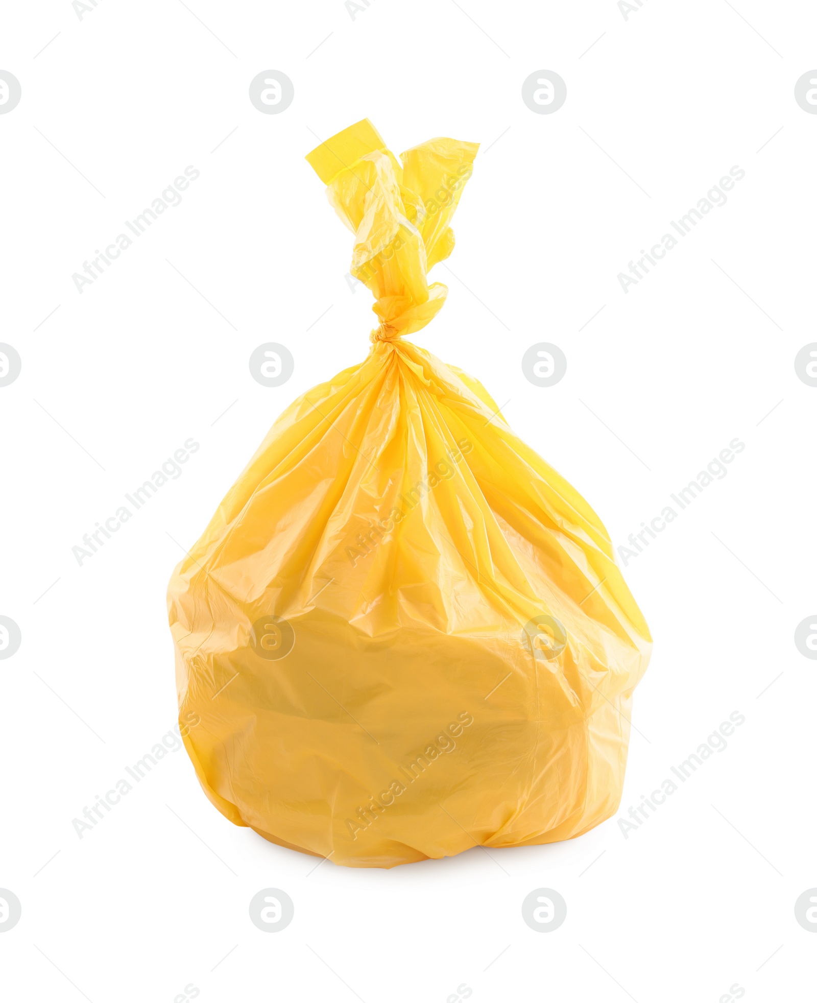 Photo of Yellow plastic garbage bag isolated on white