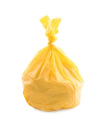 Photo of Yellow plastic garbage bag isolated on white