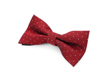 Photo of Stylish burgundy bow tie with polka dot pattern on white background