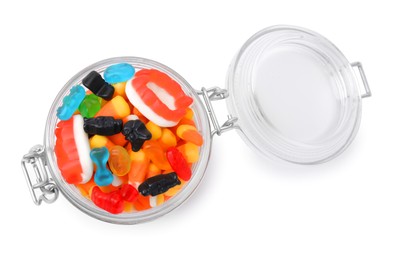 Jar of delicious colorful candies isolated on white, top view. Halloween sweets