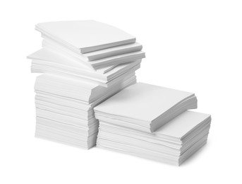 Stacks of paper sheets on white background