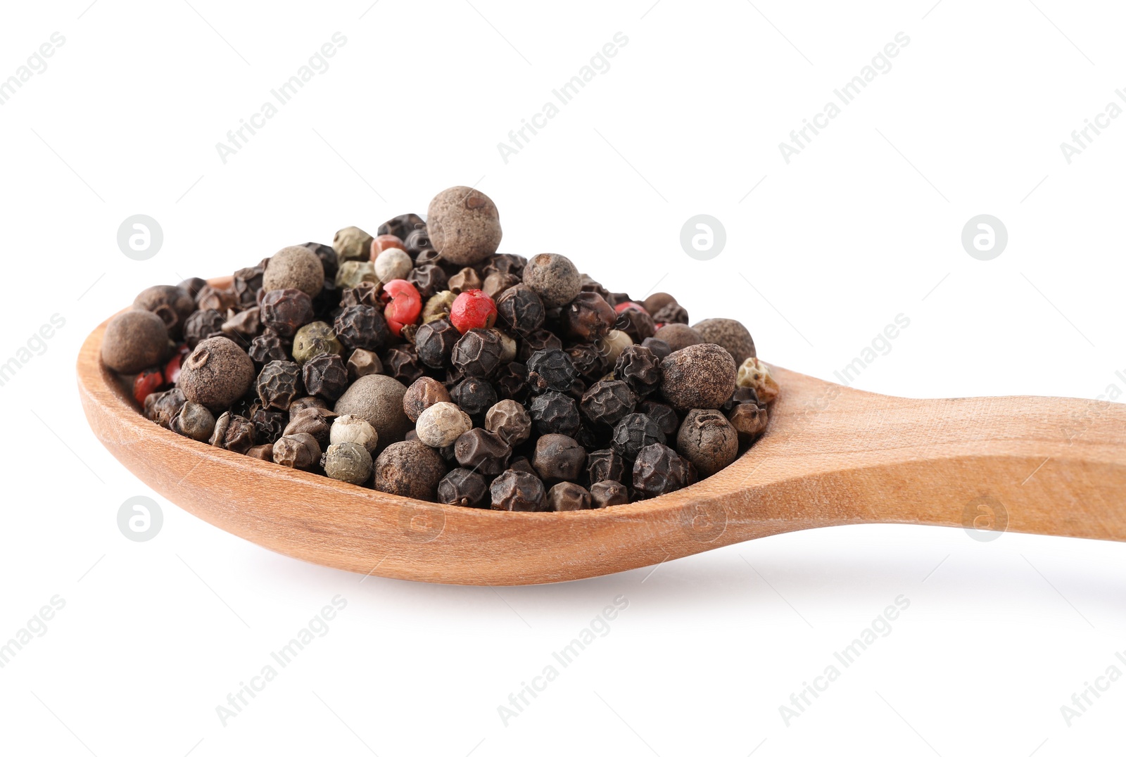 Photo of Pepper grains mix in wooden spoon isolated on white