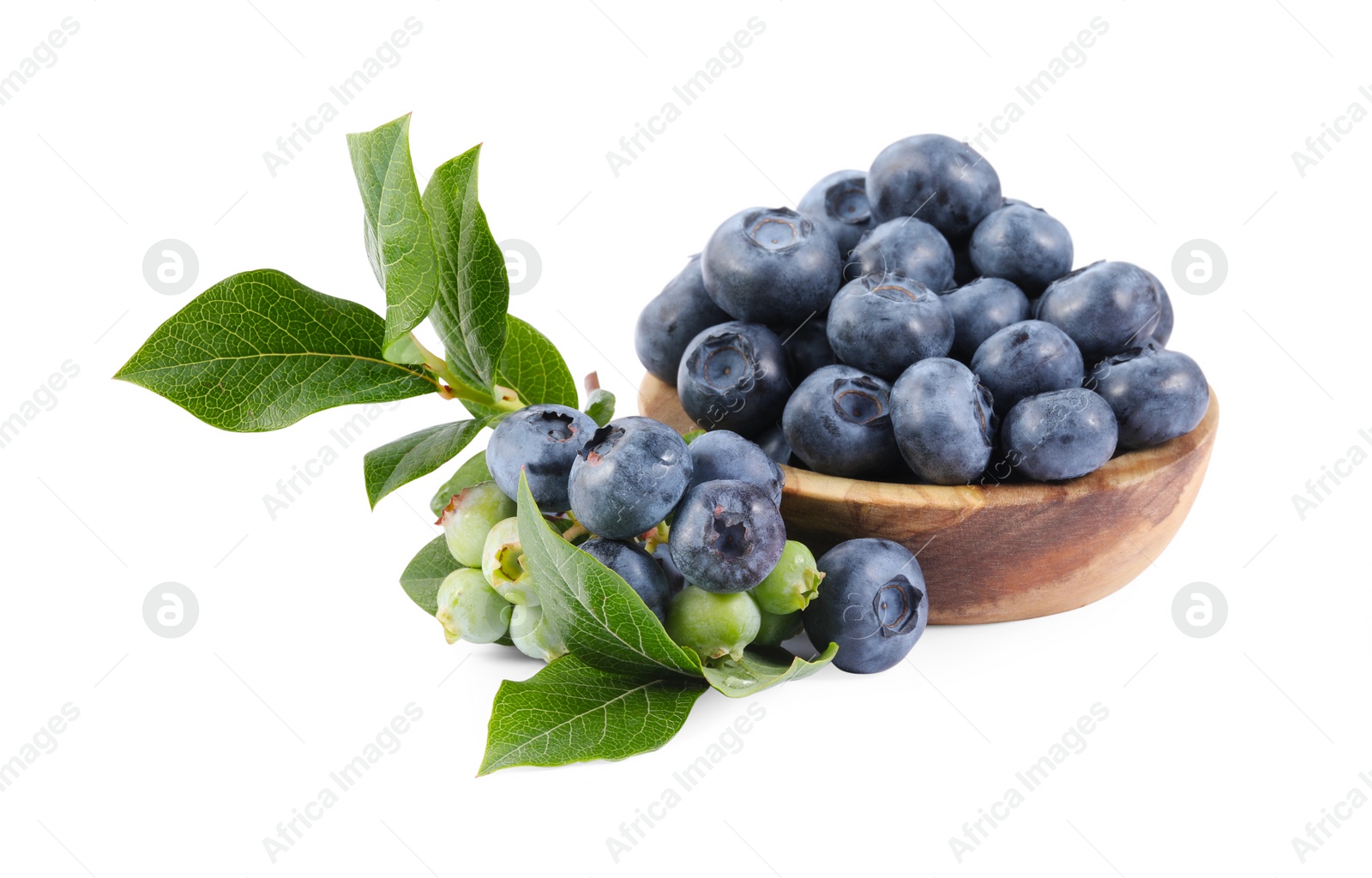 Photo of Fresh blueberries and leaves isolated on white