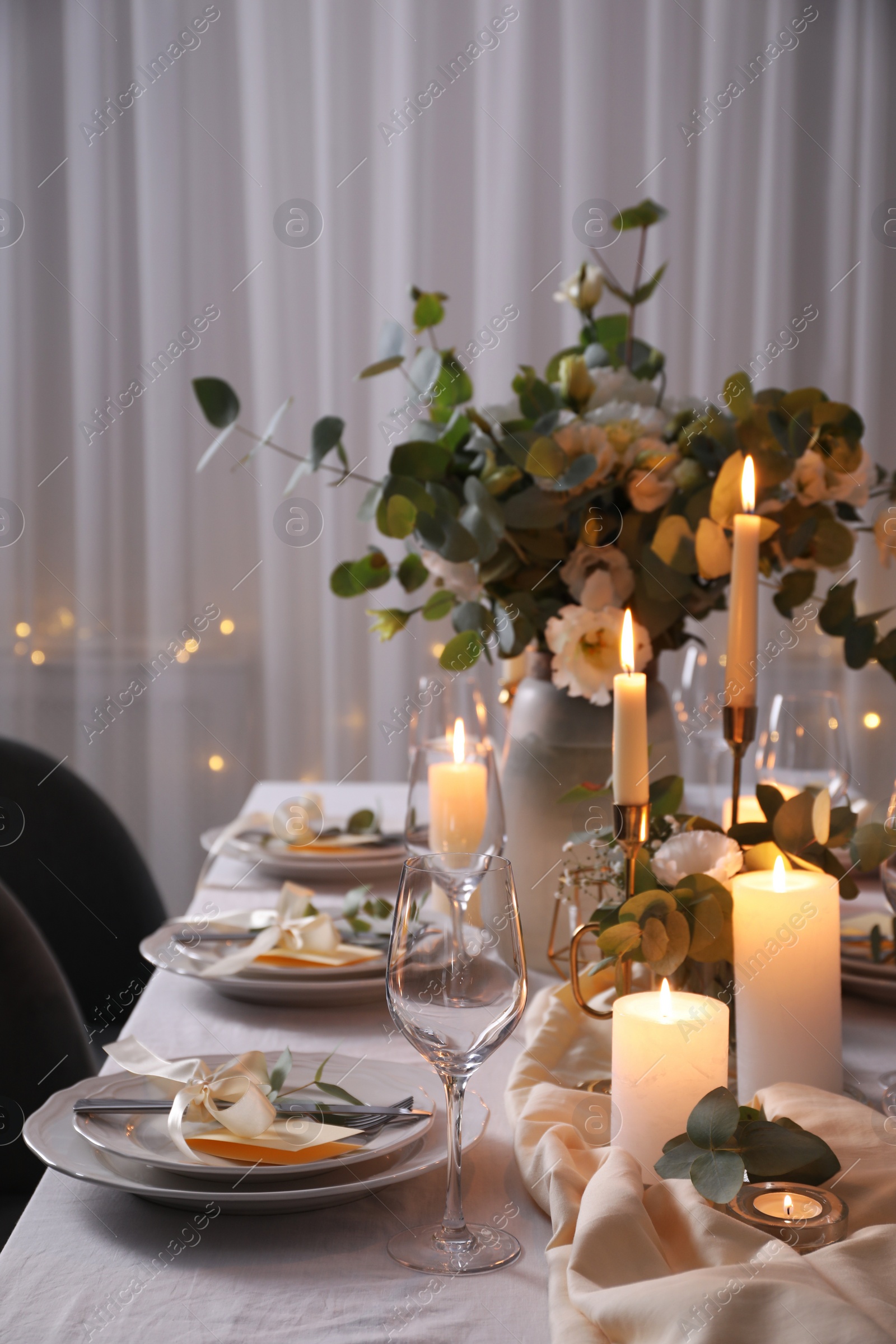 Photo of Festive table setting with beautiful decor indoors