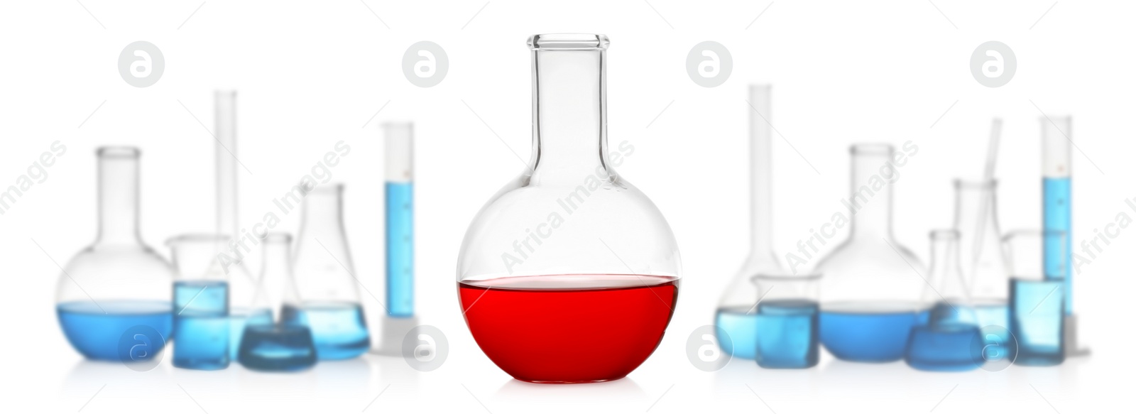 Image of Florence flask with red liquid near laboratory glassware on white background. Banner design