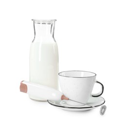 Mini mixer (milk frother), cup and bottle isolated on white