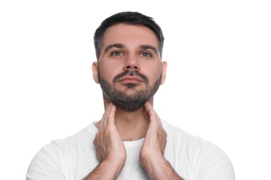 Photo of Endocrine system. Man doing thyroid self examination on white background