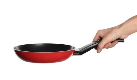 Photo of Woman holding new clean frying pan on white background