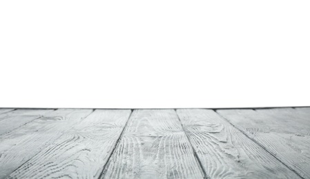 Photo of Empty wooden table surface on white background. Mockup for design