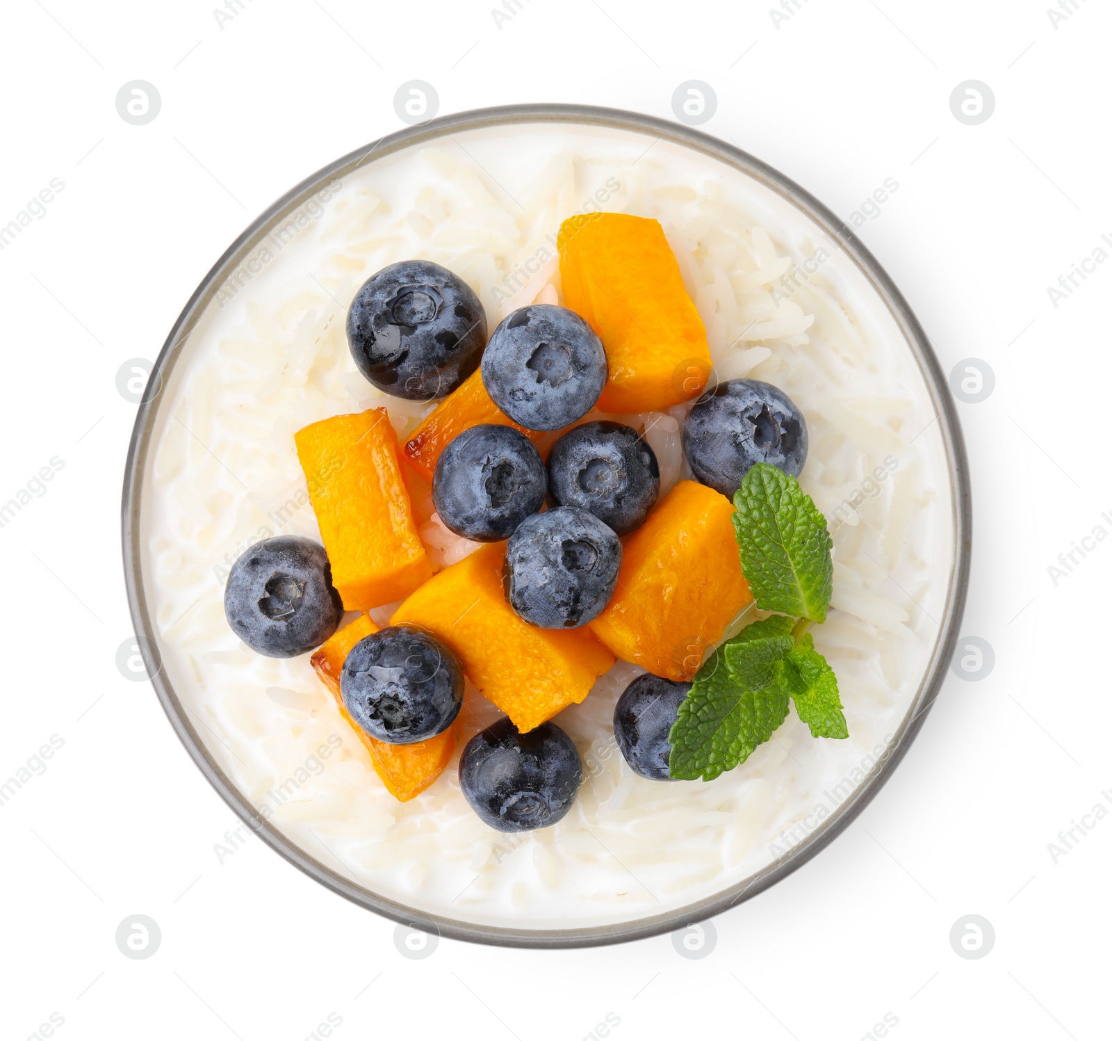 Photo of Delicious rice porridge with blueberries and pumpkin isolated on white, top view