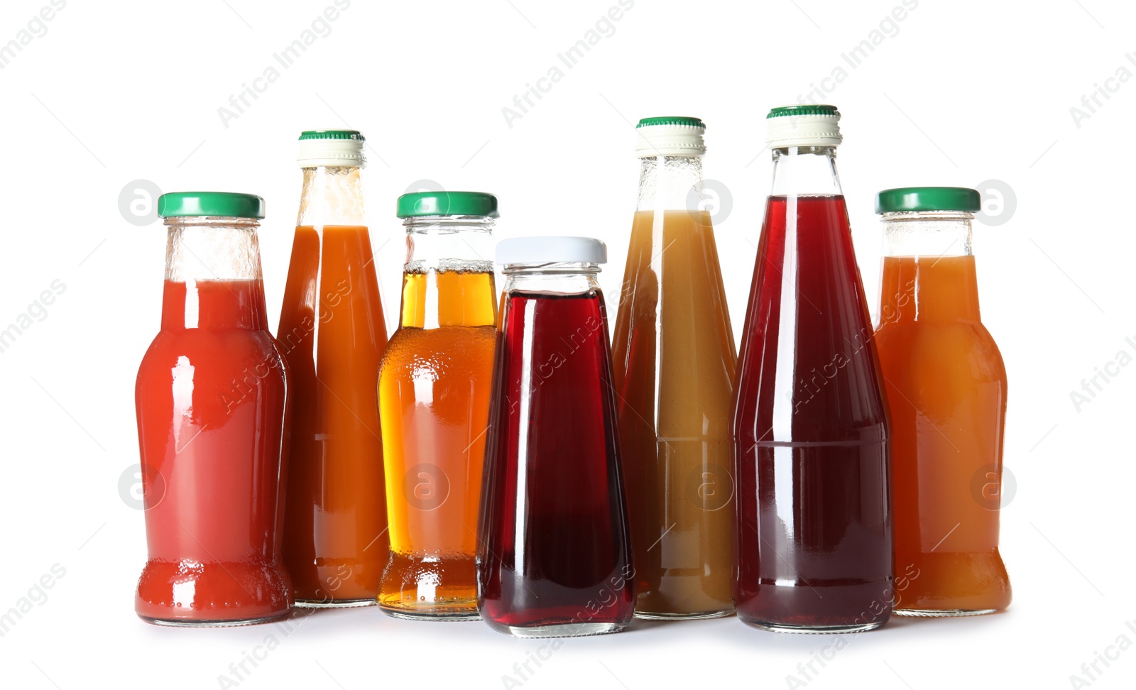 Photo of Bottles with different drinks on white background