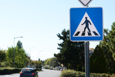 Pedestrian Crossing road sign on city street. Space for text