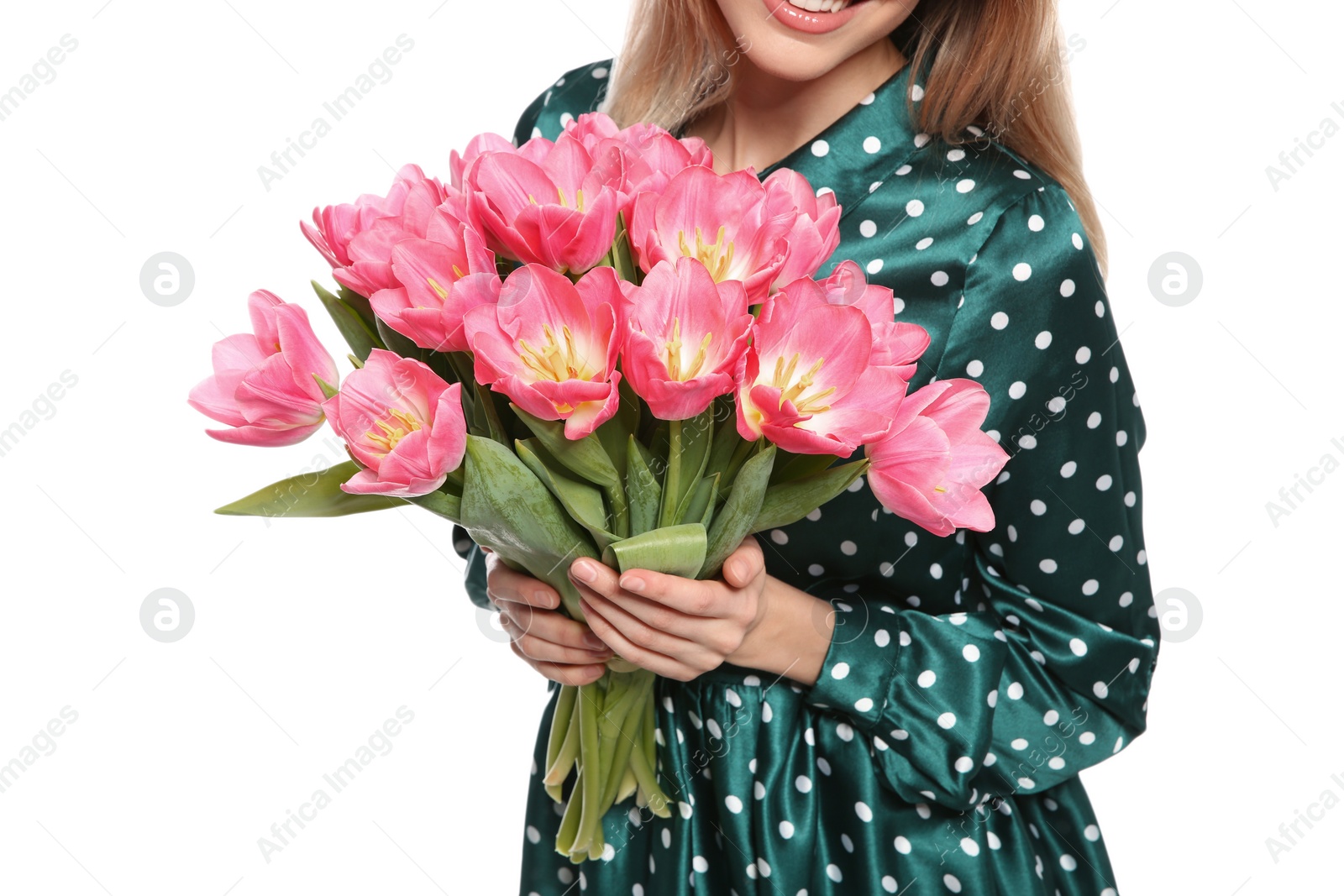 Photo of Young girl with beautiful tulips on white background, closeup. International Women's Day