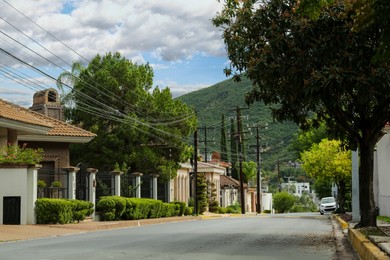 Photo of Beautiful view of city street with road near mountain
